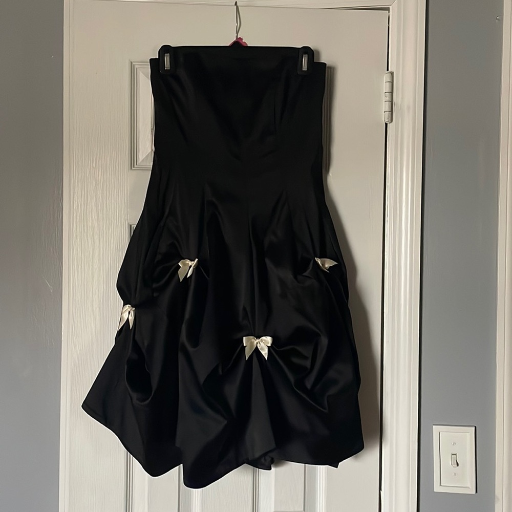 Teeze Me black strapless cocktail dress with ivory bow pickups.